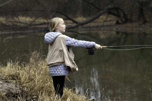 girl trout fishing