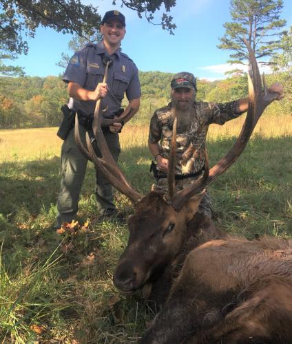 Chris Irick with agent and elk