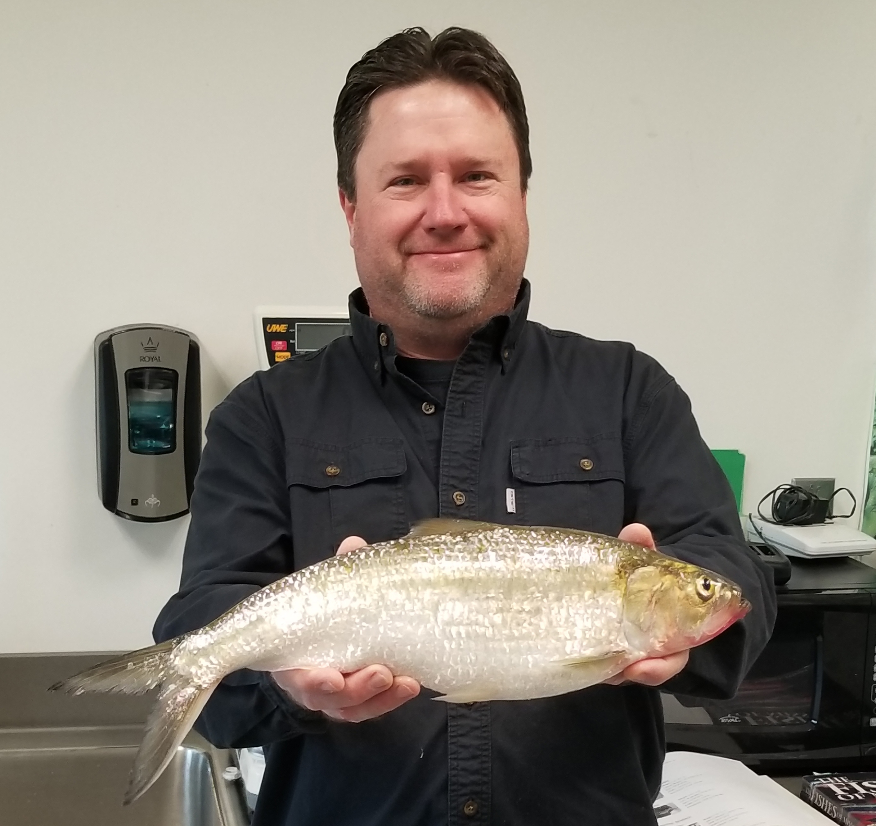 Craig Barulich holding the new state-record skipjack herring
