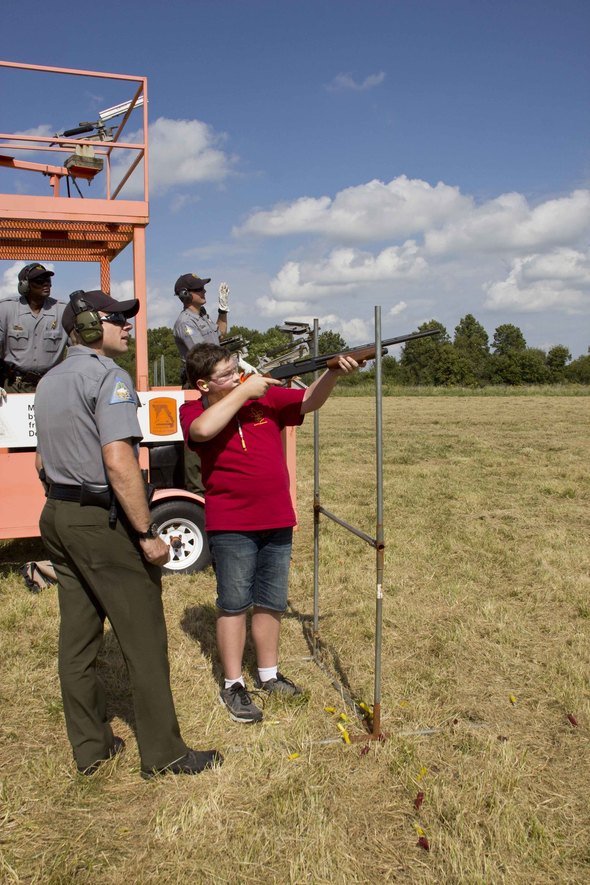 MDC agents helping people shoot clays.