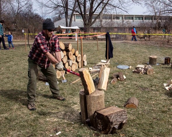 A man splits firewood