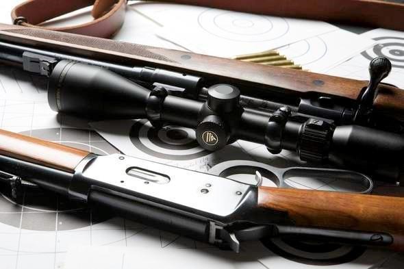 Closeup pic of rifle and shotgun
