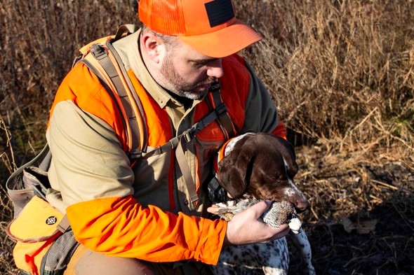 quail hunter with dog
