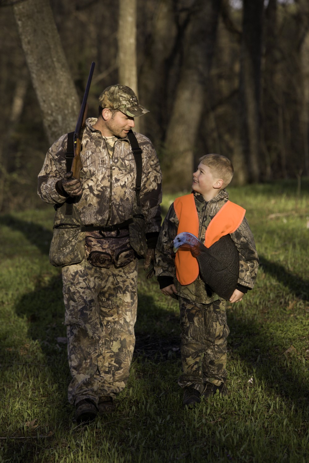 Turkey hunter with son