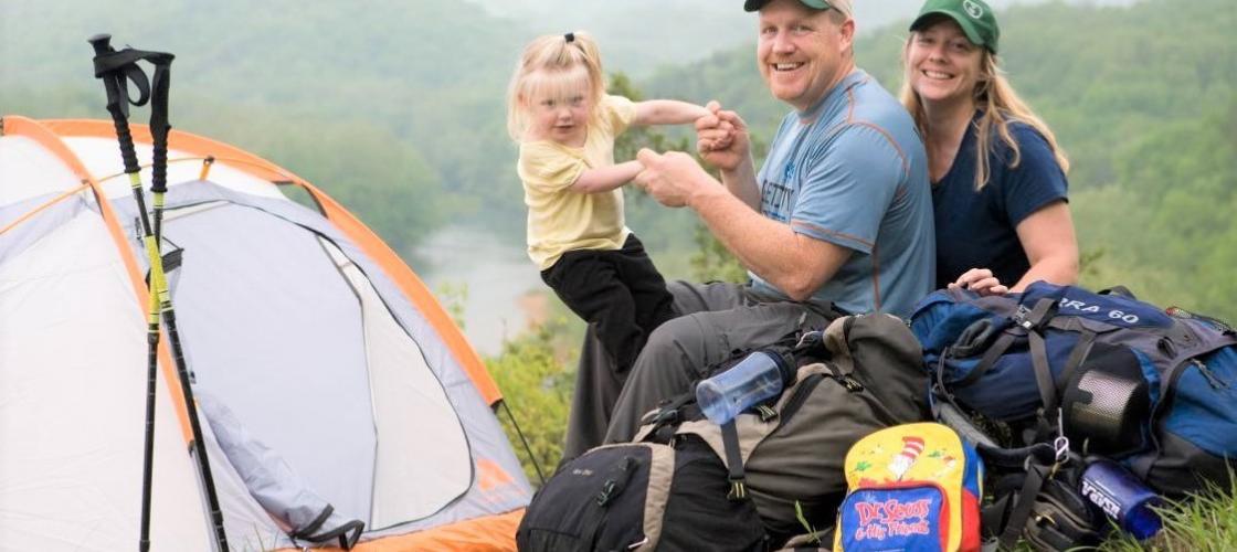 Couple camps with toddler