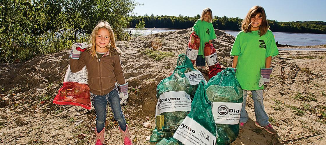 Kids doing river cleanup