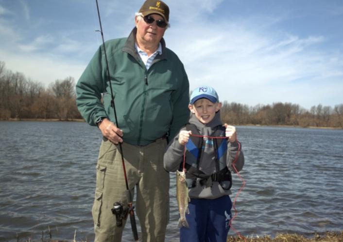 Grandpa and grandson fishing