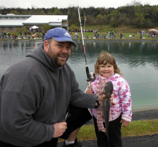 Kids catching fish at Lost Valley Hatchery's Kids Free Fishing Day.