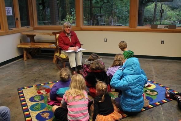 An MDC staff member conducts story time at Burr Oak Woods Nature Center.