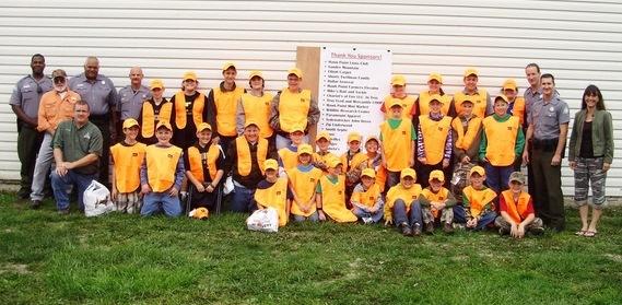 Group shot of youth deer hunting clinic participants, MDC staff, and volunteers