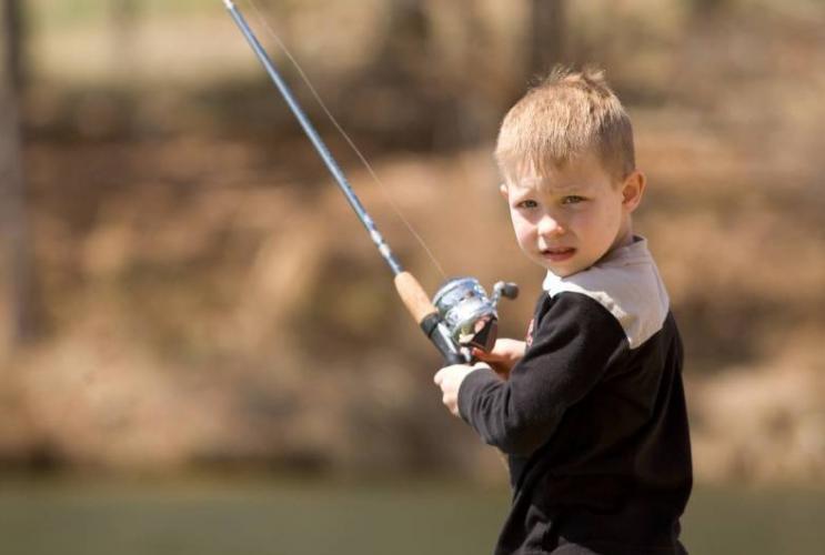boy with fishing pole
