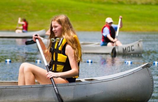 Teenage girl on canoe