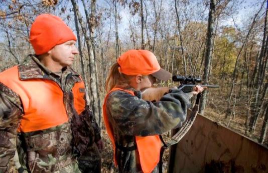 Father and daughter deer hunting