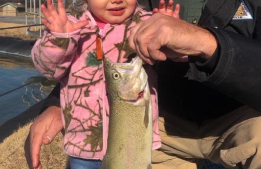 child with trout