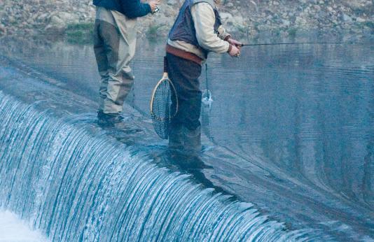 photo of two anglers on the dam at Montauk State Park