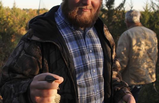 Jacob Decker of Missouri Western State University doing birdbanding