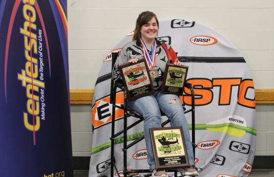 Ivy Walton poses with her trophies at the NASP Eastern National Tournament in Louisville, Ky.