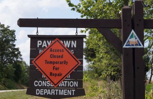 The Paydown Access entrance sign with a closed for repair sign.