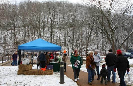 Visitors gather for Rockwoods Reservation's Winter in the Woods Festival.